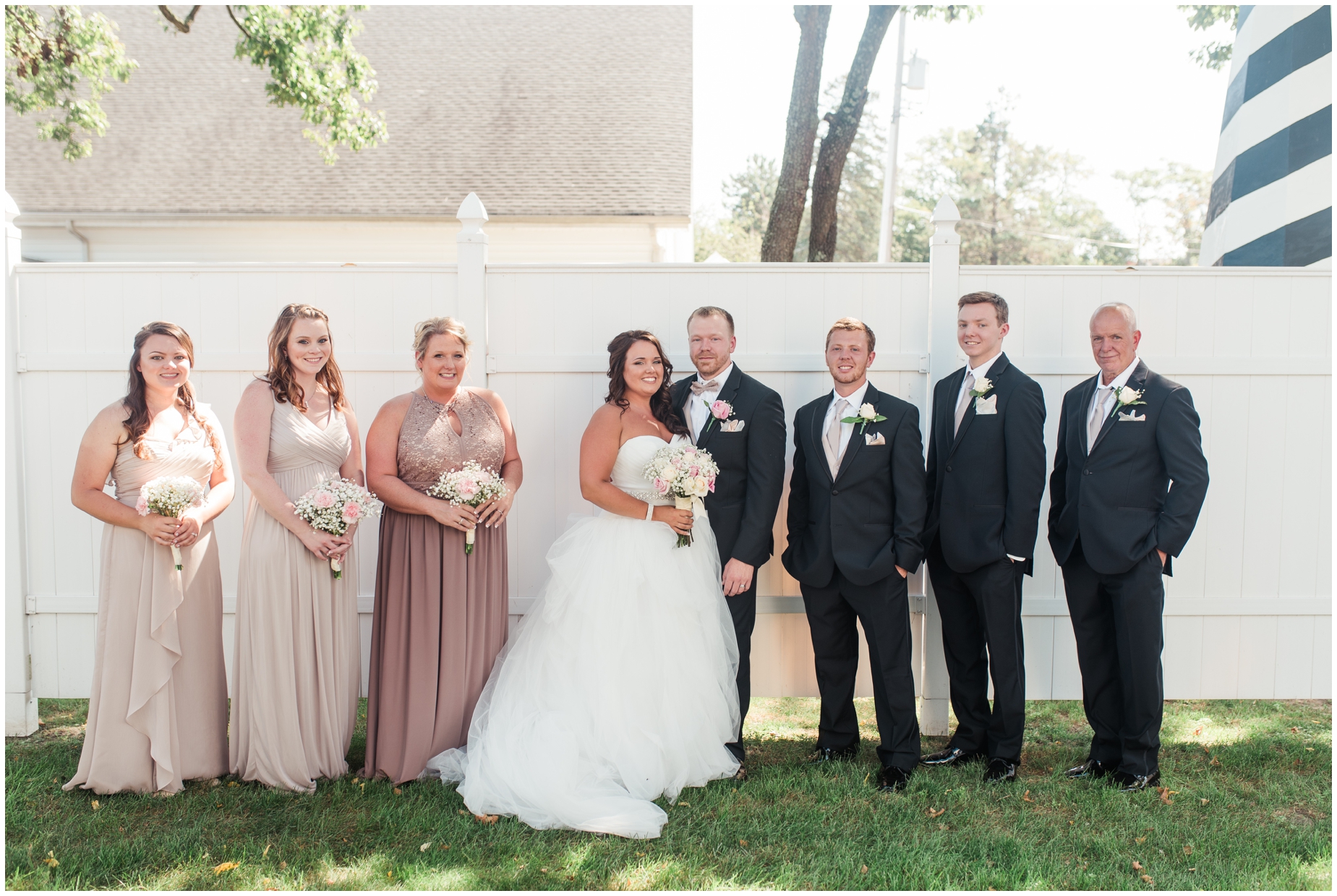 A pink and tan coastal wedding at Celebrations at the Bay by Maryland Wedding Photographer Megan Bennett Photography