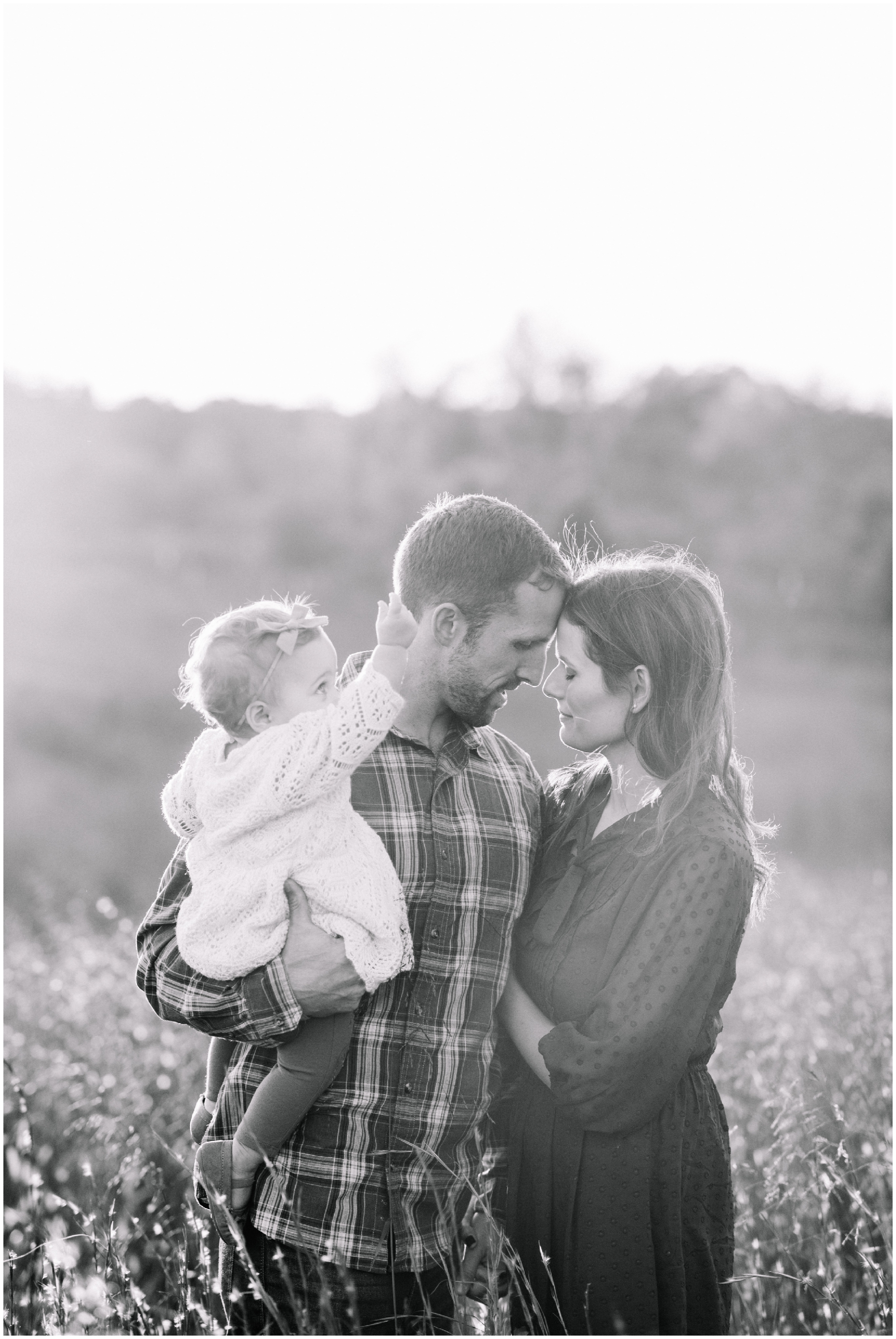 An intimate rustic family photo at Howard County Conservancy by Maryland Photographer Megan Bennett Photography