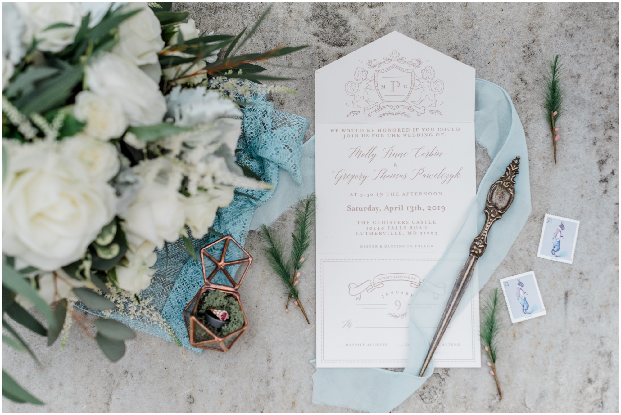 Wedding day details and invitations for a blue colored spring wedding at Cloisters Castle in Maryland