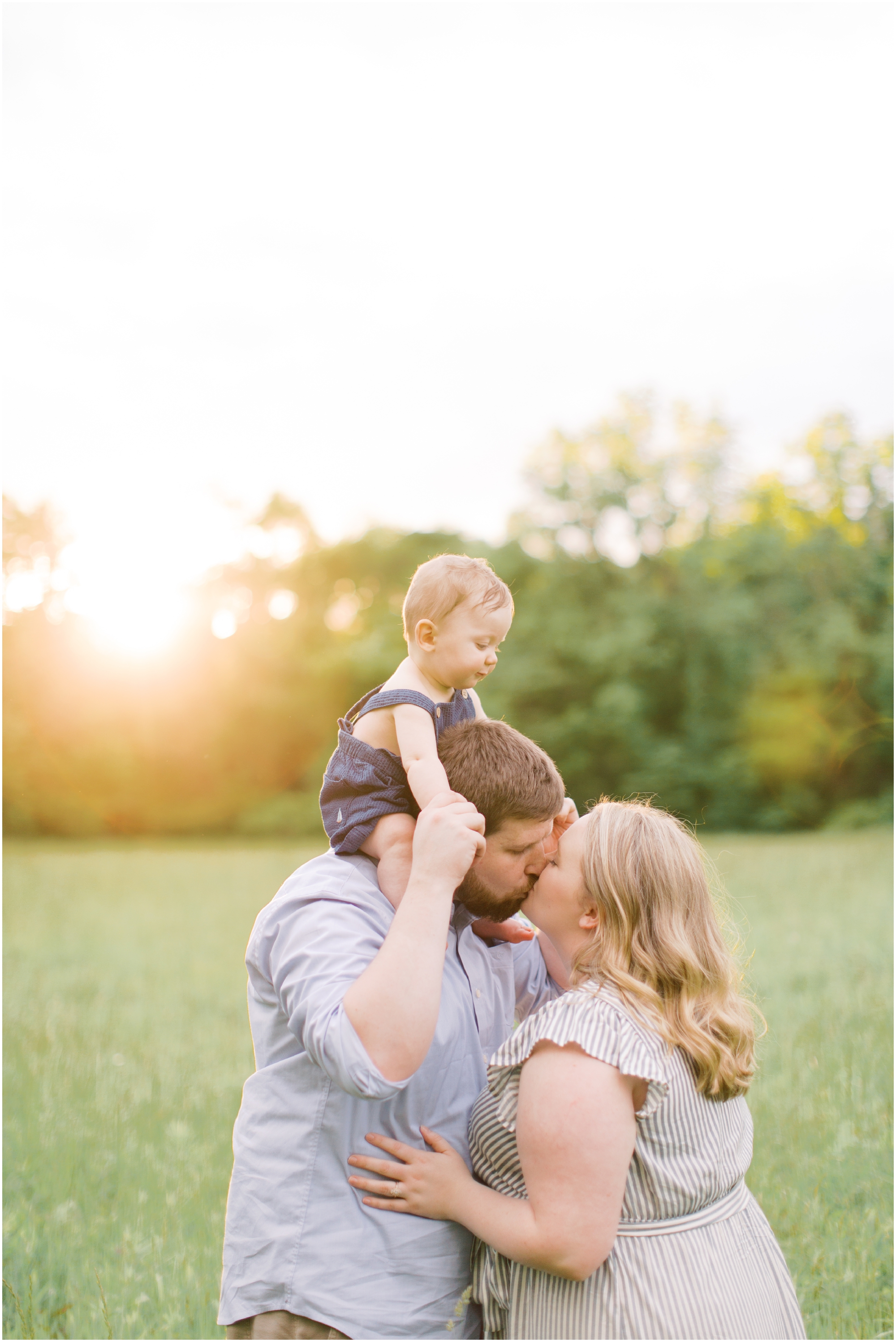 Family Portraits in a Farm Field with neutral and blue outfits