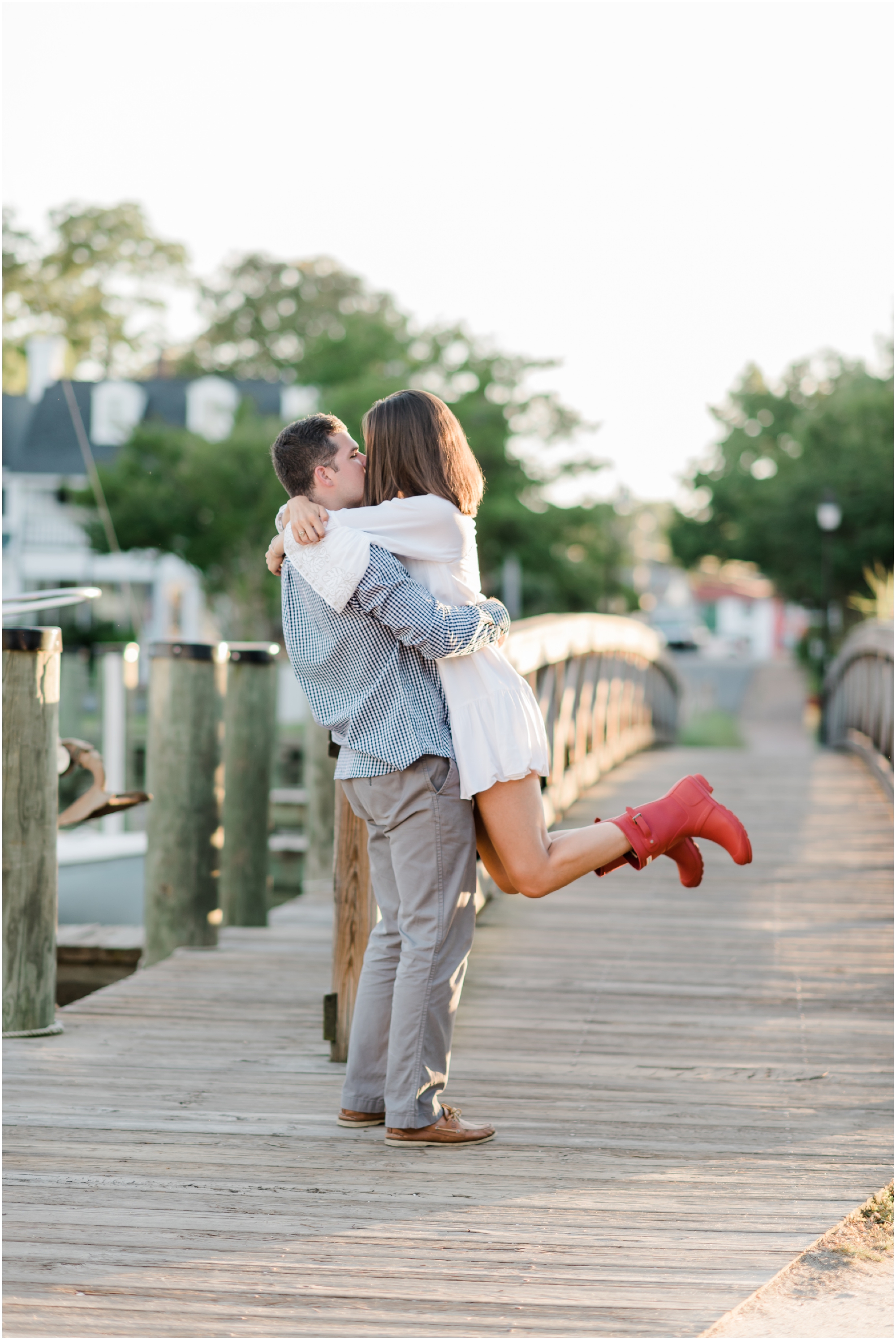 A Romantic and Rustic Nautical Summer Eastern Shore Engagement featuring oysters at the St Michaels dock by Megan Bennett Photography