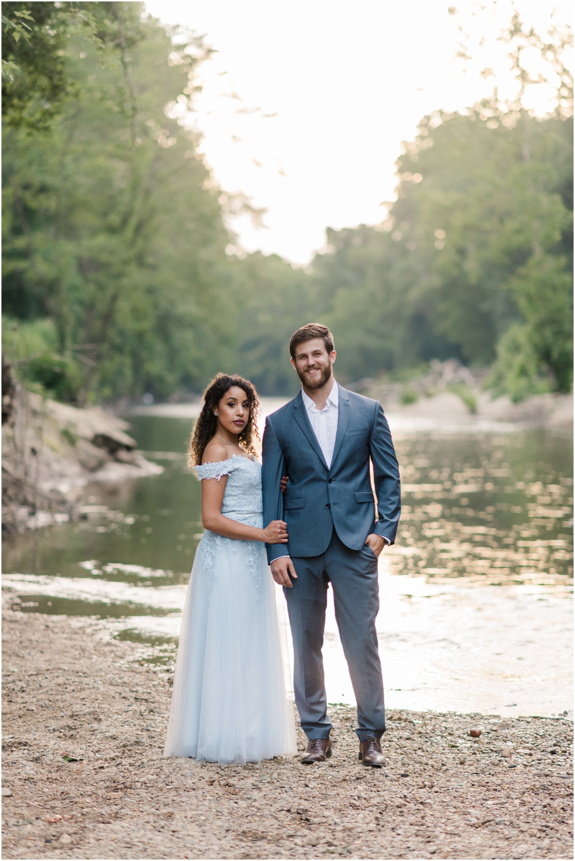A Romantic Ellicott City Engagement at the Patapsco Valley State Park featuring a Creek, Fun Couple, and Light Blue Dress #ellicottcityphotographer #patapscovalleystatepark #MarylandWeddingPhotographer