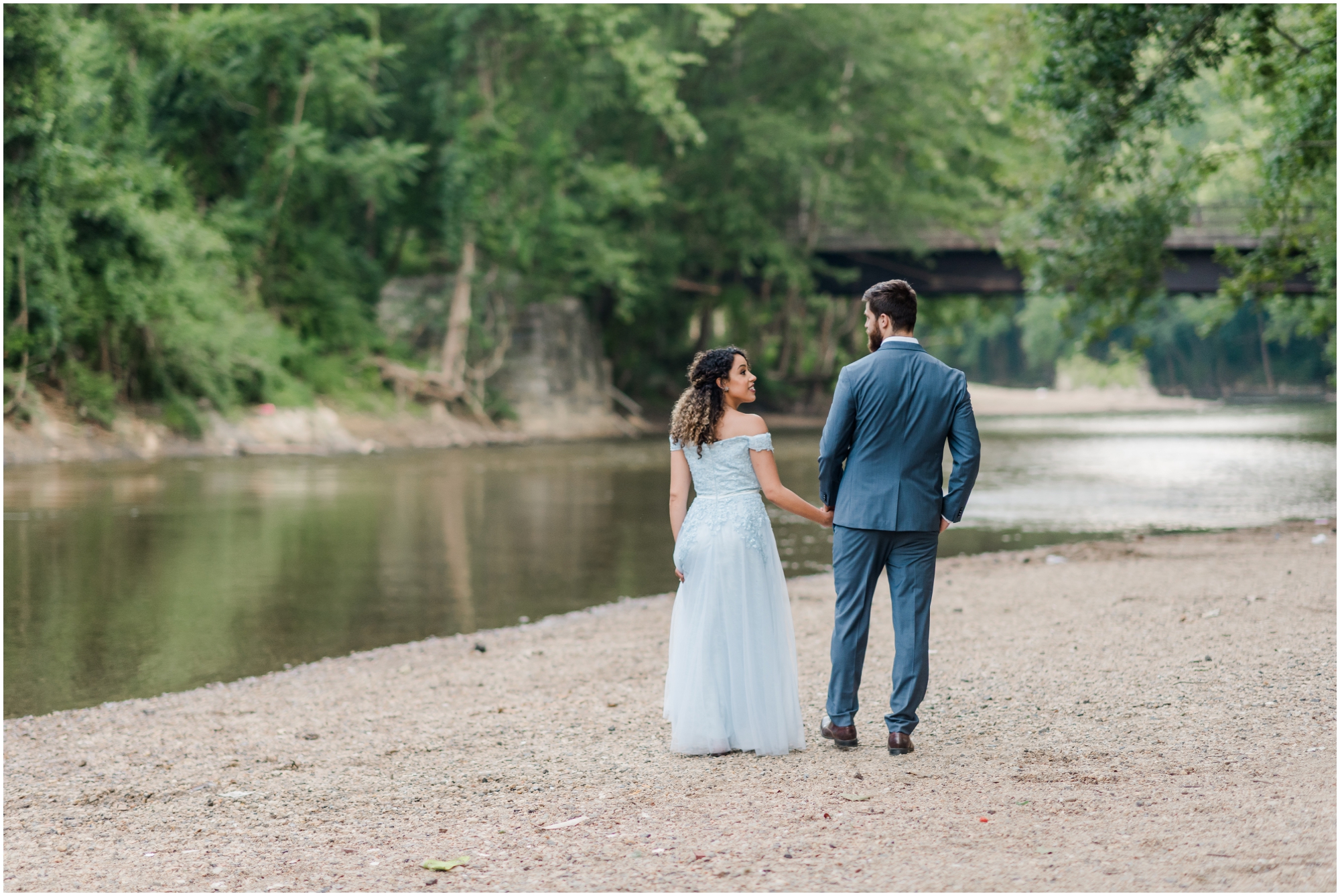A Romantic Ellicott City Engagement at the Patapsco Valley State Park featuring a Creek, Fun Couple, and Light Blue Dress #ellicottcityphotographer #patapscovalleystatepark #MarylandWeddingPhotographer
