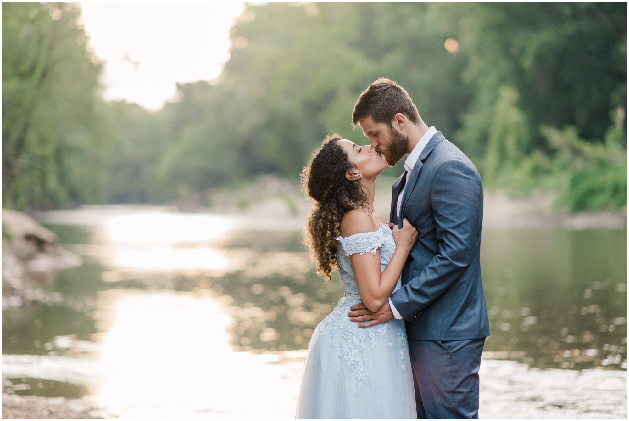 A Romantic Ellicott City Engagement at the Patapsco Valley State Park featuring a Creek, Fun Couple, and Light Blue Dress #ellicottcityphotographer #patapscovalleystatepark #MarylandWeddingPhotographer