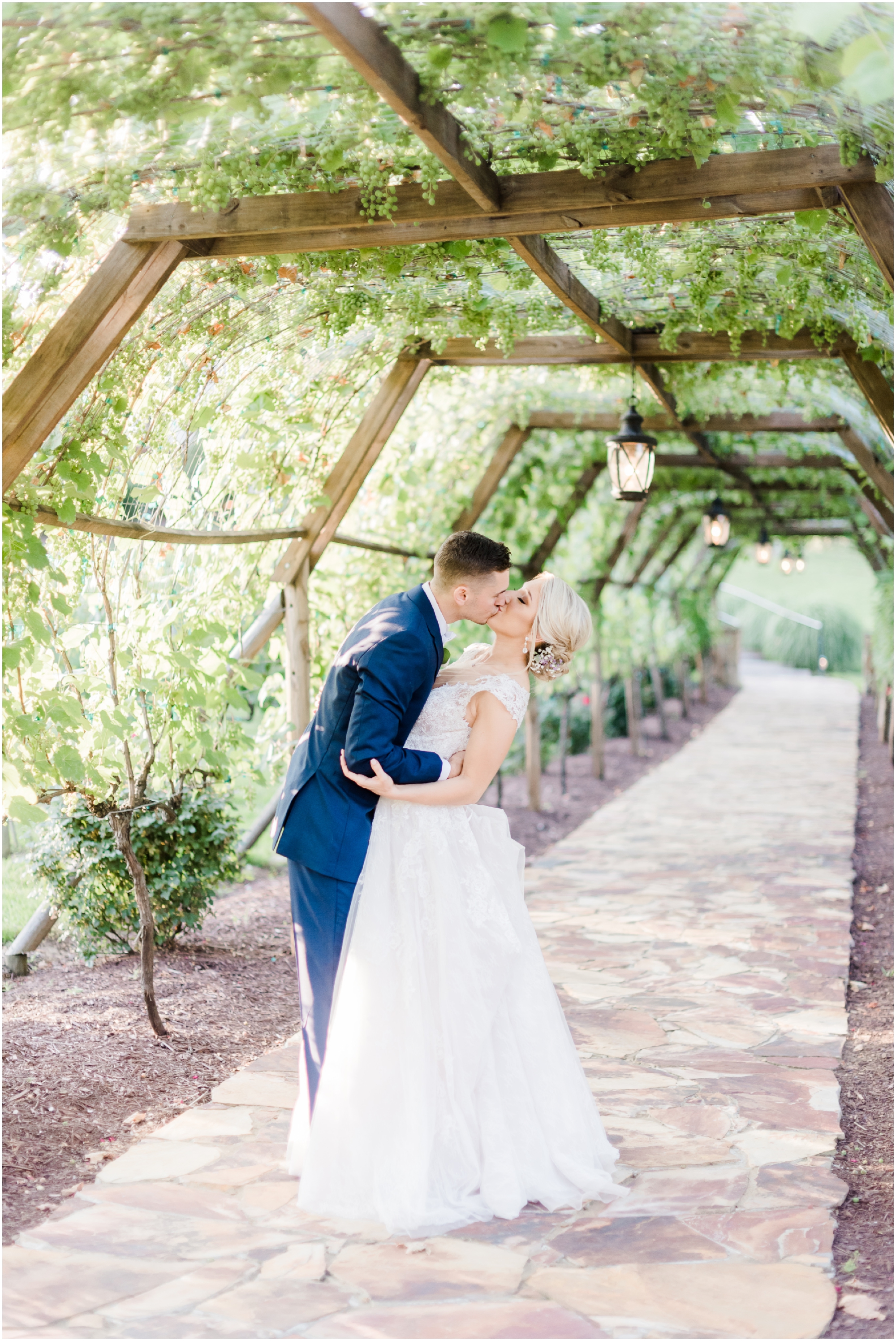 Romantic Summer Winery Wedding featuring purple wedding colors, family heirlooms, and a historic church ceremony at Running Hare Vineyard in Southern Maryland by Wedding Photographer Megan Bennett Photography #runningharevineyard #marylandweddingphotographer #runningharevineyardwedding