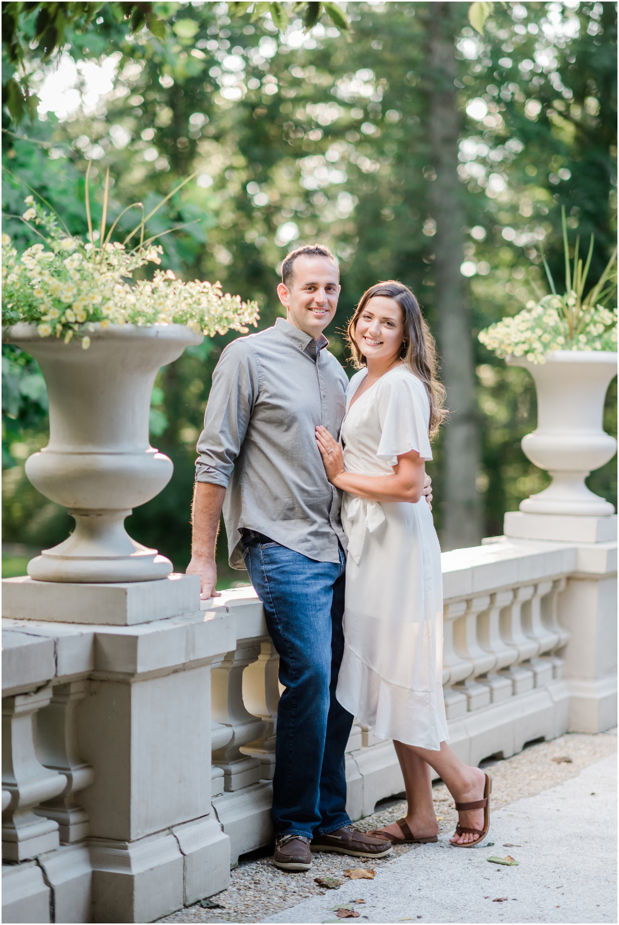 Elegant Summer Engagement Photo session at the Liriodendron Mansion in BelAir Maryland featuring a brunette couple and white dress by Maryland Wedding Photographer Megan Bennett Photography #liriodendronmansion #marylandweddingphotographer #belairmdphotographer