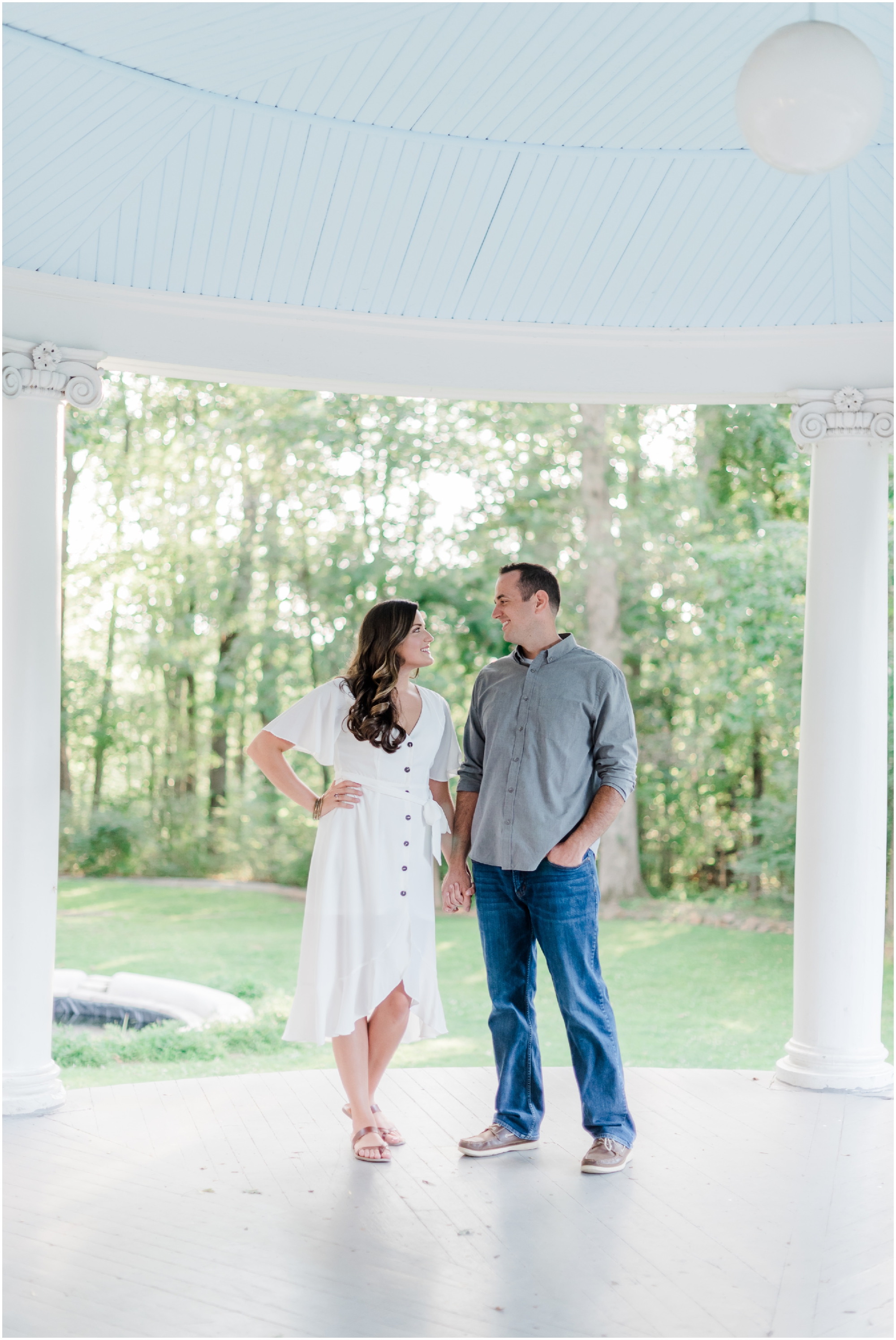 Elegant Summer Engagement Photo session at the Liriodendron Mansion in BelAir Maryland featuring a brunette couple and white dress by Maryland Wedding Photographer Megan Bennett Photography #liriodendronmansion #marylandweddingphotographer #belairmdphotographer