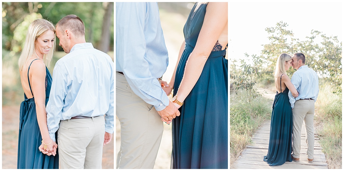 A Coastal Eastern Shore engagement photo featuring a flowy navy blue dress and a grassy beach at Terrapin Park in Stevensville, Maryland by Eastern Shore Photographer Megan Bennett Photography