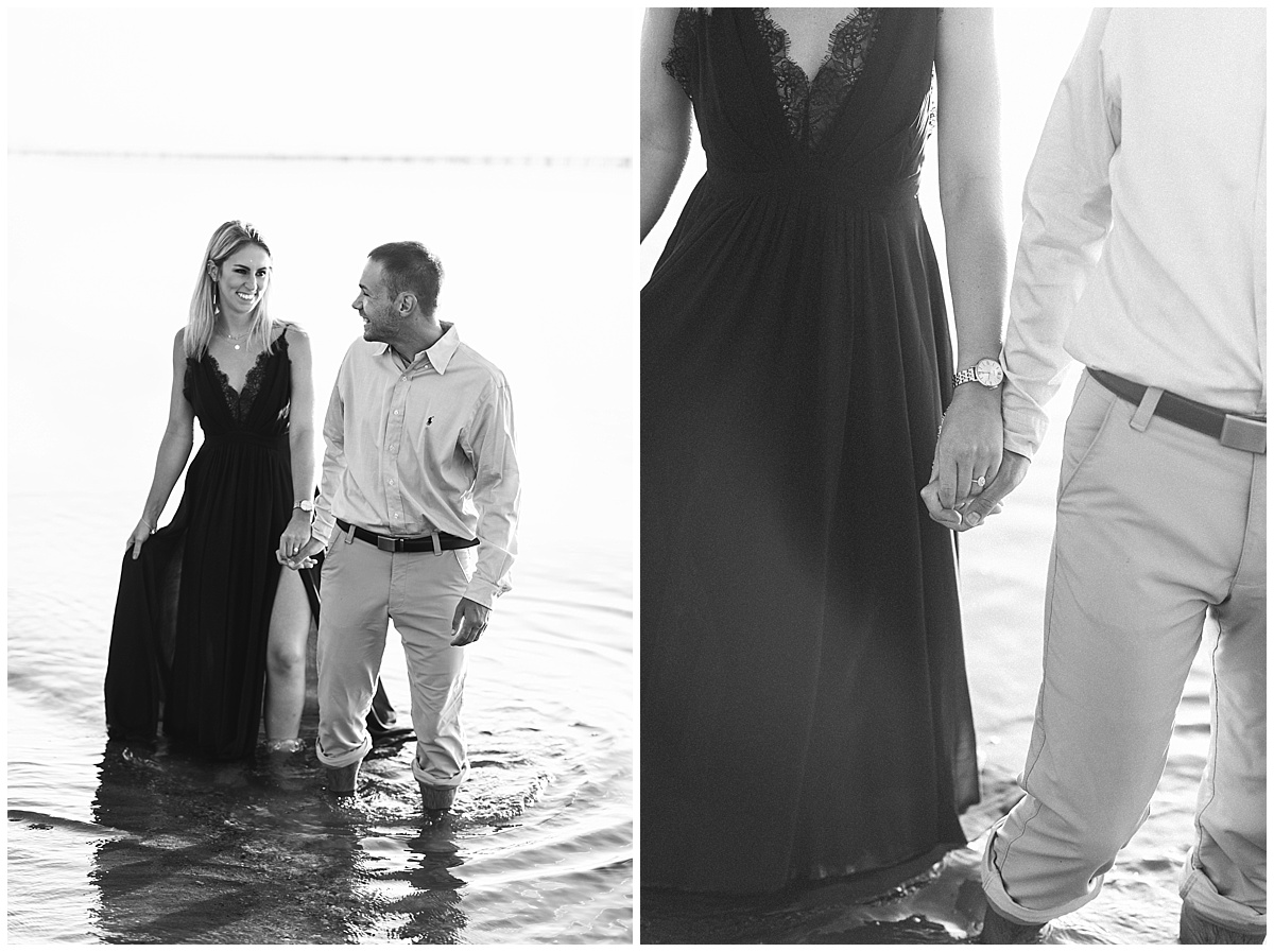 A beach engagement photo featuring a flowy navy blue dress and a grassy beach at Terrapin Park in Stevensville, Maryland by Maryland Photographer Megan Bennett Photography