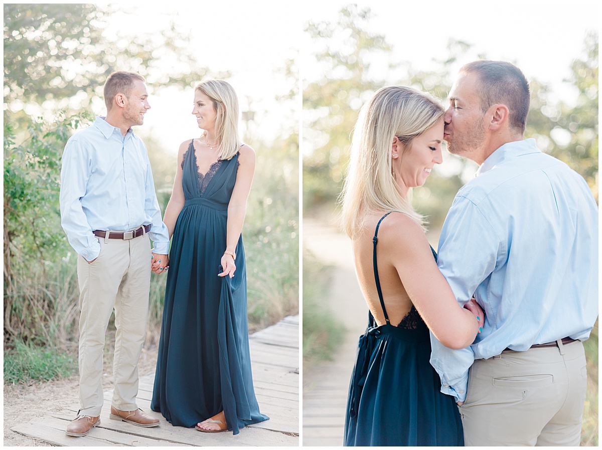 A Coastal Eastern Shore engagement photo featuring a flowy navy blue dress and a grassy beach at Terrapin Park in Stevensville, Maryland by Eastern Shore Photographer Megan Bennett Photography