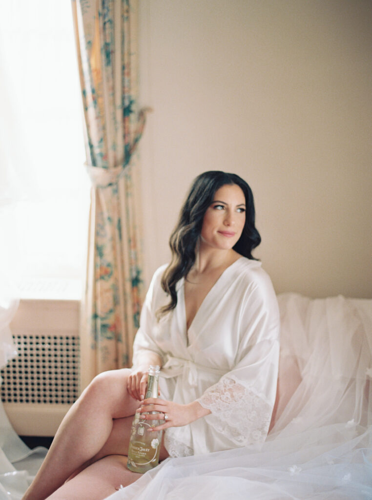 Bride getting ready at Strong Mansion in Maryland — elegant bridal suite with natural light, one of the most beautiful Maryland wedding getting ready spaces.
